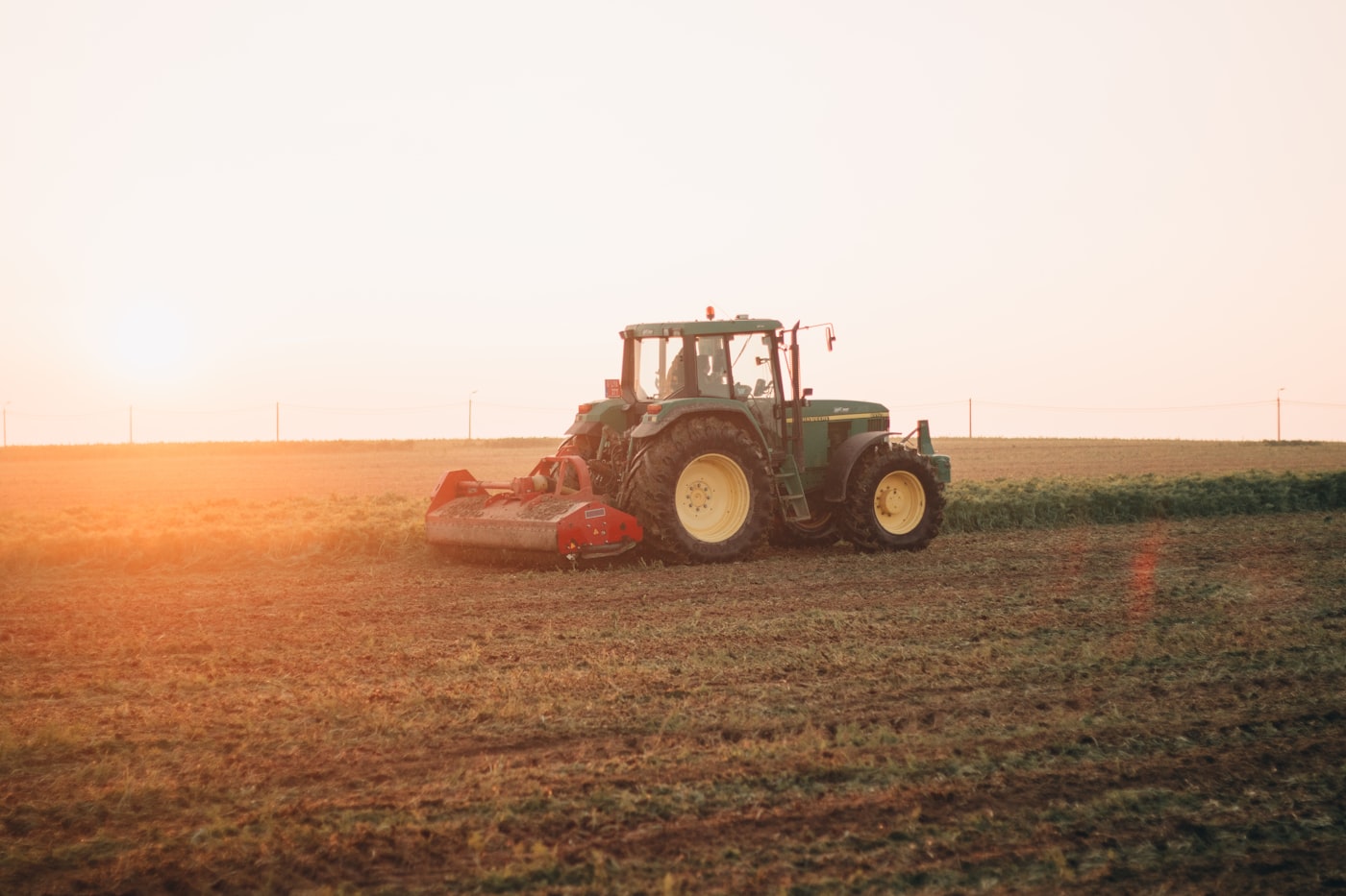 Bush hogging a field